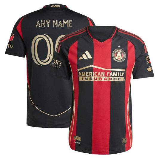 Adidas Atlanta United FC 2025 jersey with red and black stripes featuring team logo and sponsor branding